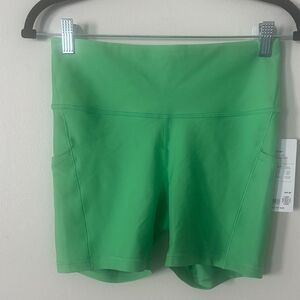 ATHLETA INTERVAL STASH 5" SHORT M (green)